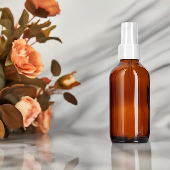 JUVITUS 4 oz / 120 ml Amber Glass Boston Round Bottle with White Treatment Pump (24 pack)