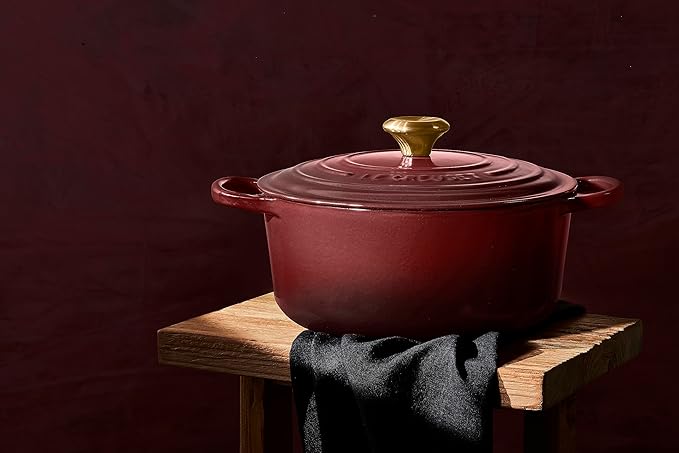 Le Creuset Enameled Cast Iron Signature Round Dutch Oven, 5.5 qt., Garnet